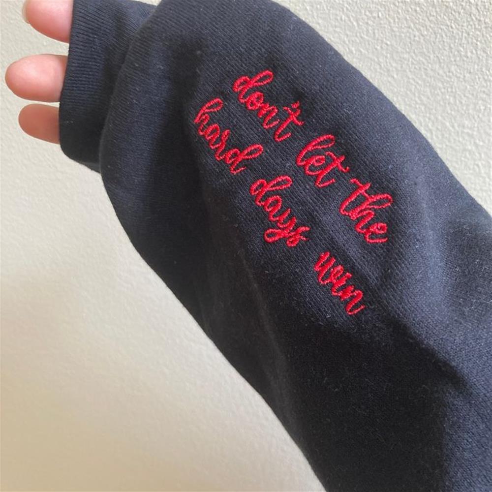 'don't let the hard days win' Embroidered Sweatshirts